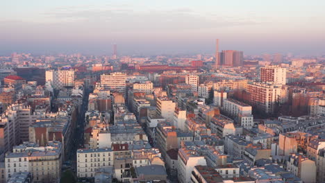 Paris-sunset-aerial-shot-Bichat-Hospital-chimney-rooftops-view-polluted-sky